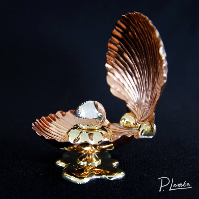 Silver Pearl in a Seashell